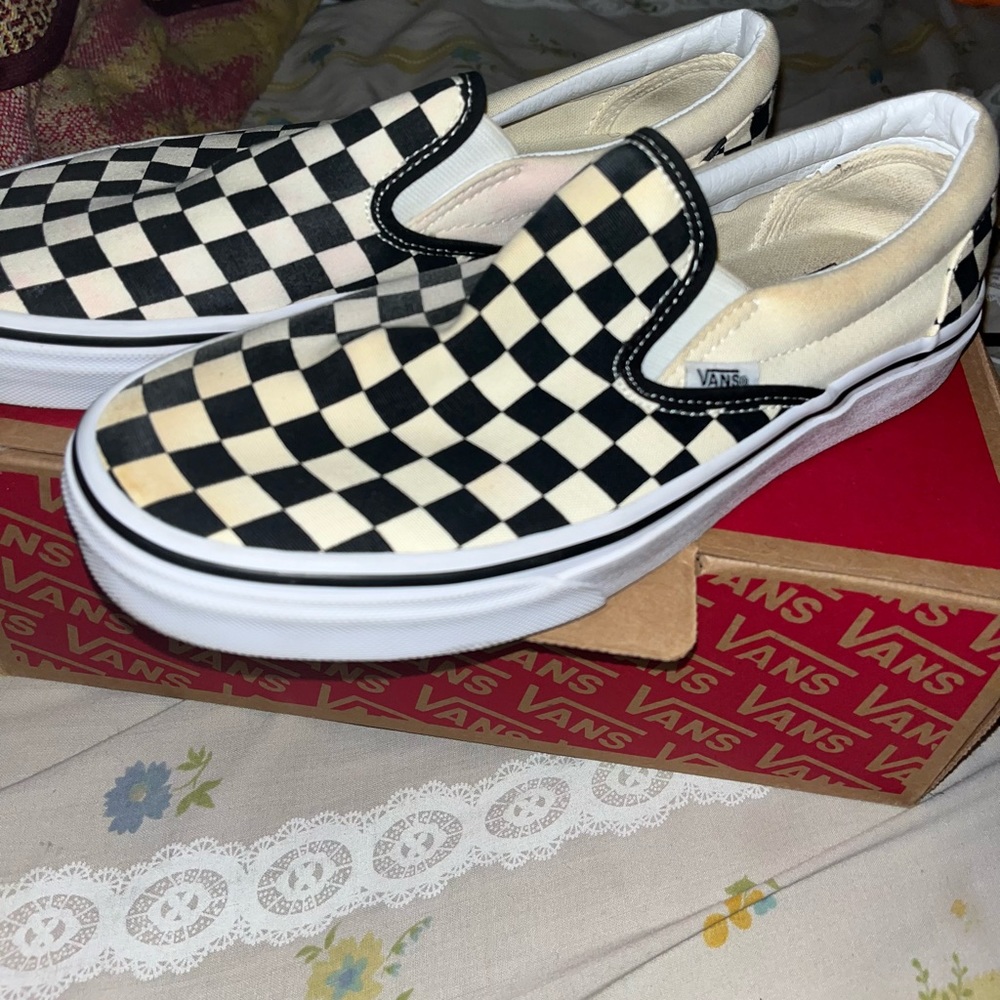 Slide on checkerboard vans